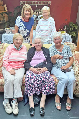 Five ladies pose for the camera