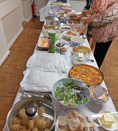 A table laid out with food for a buffet
