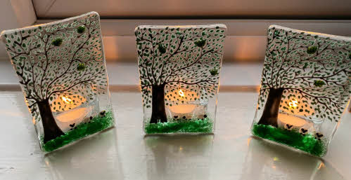 Three summer sheep tea-light holders