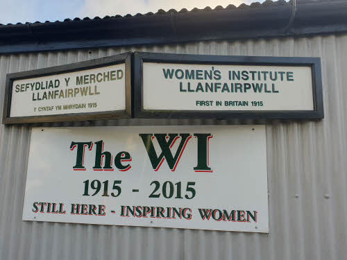 The signs outside the WI museum, in both English and Welsh.