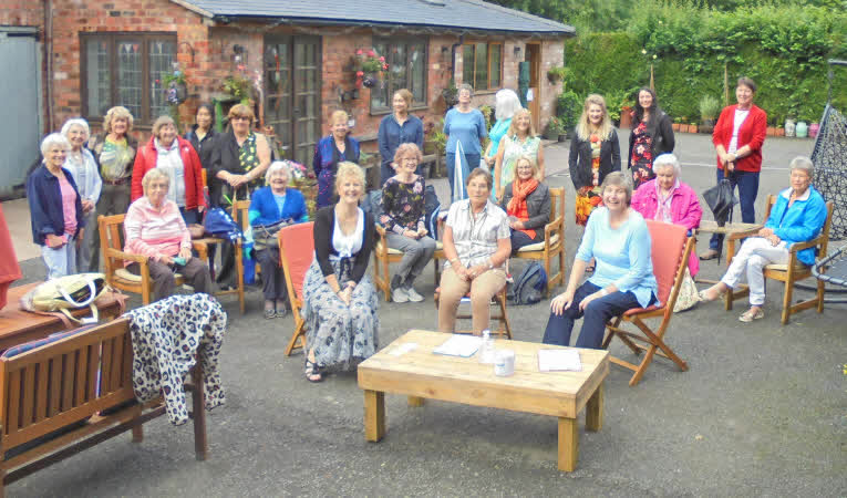 Over 20 members gathered for a group photo