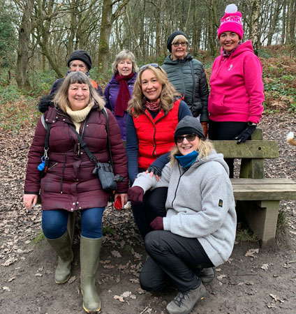 Several members pose for a photo on Haughmond Hill before setting off for their walk