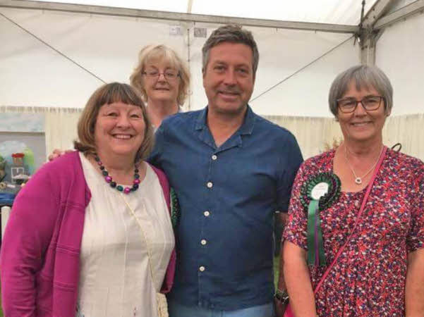 Our social secretary, Carol, with a couple of other WI members, with John Torode centre